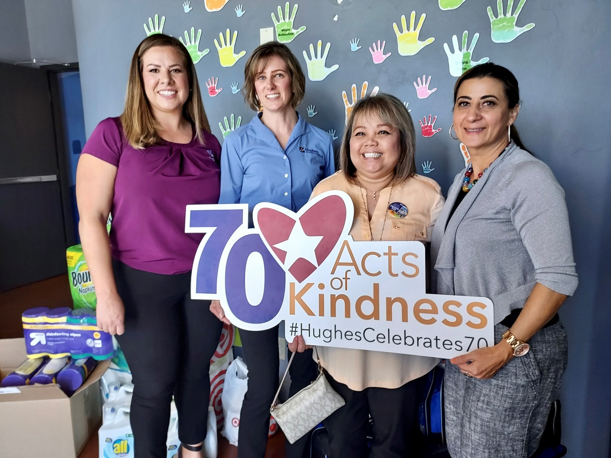 hughes and Erik Hite Foundation team pose for photo