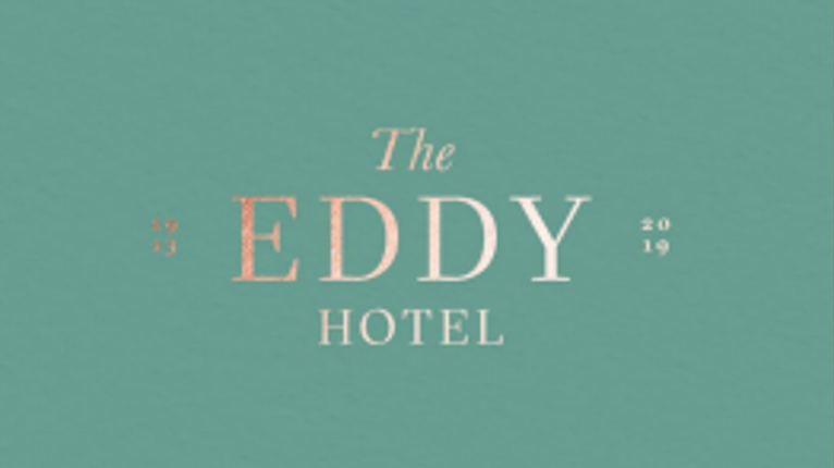 Copper text on green background.